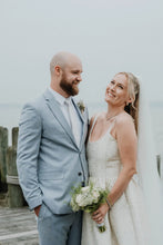 Load image into Gallery viewer, wedding Couple on a beach with a cloudy sky