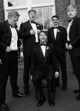Load image into Gallery viewer, Men in formal attire posing outdoors, likely for a wedding or formal event.