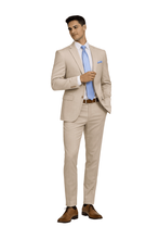 Load image into Gallery viewer, Man wearing a beige suit with a blue shirt on a white background