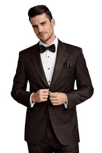 Load image into Gallery viewer, Man wearing a formal brown suit with a bow tie on a white background