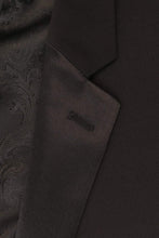 Load image into Gallery viewer, Close-up of a coat with a notch pattern lapel.
