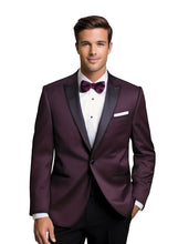 Load image into Gallery viewer, Man wearing a plum tuxedo with a white shirt and bow tie on a white background