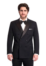 Load image into Gallery viewer, Man wearing a black double breasted tuxedo with a bow tie on a white background
